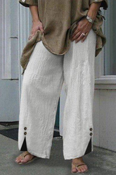 Bas de couleur unie à jambes larges et droites avec boutons fendus